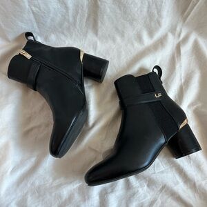 Black ankle boots.